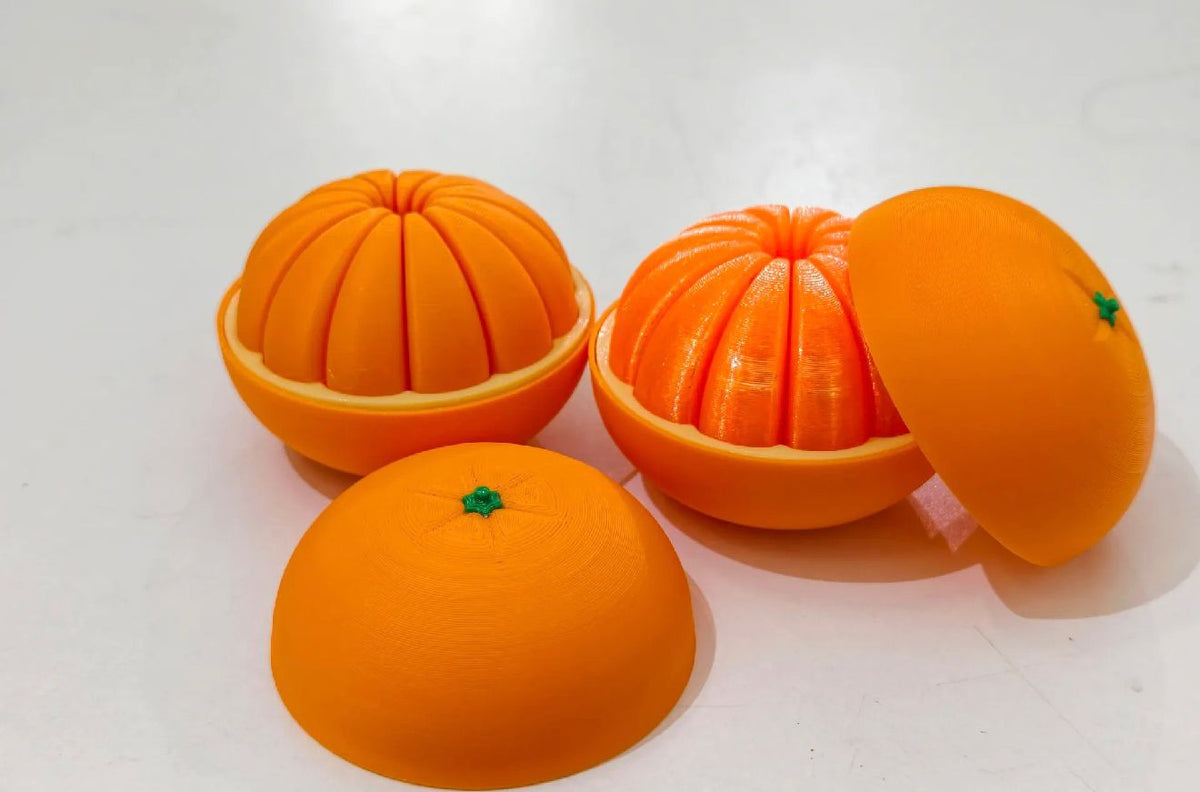 Naranja Fidget 3D — Caja Sorpresa: juguete antiestrés impreso en 3D, hecho en México