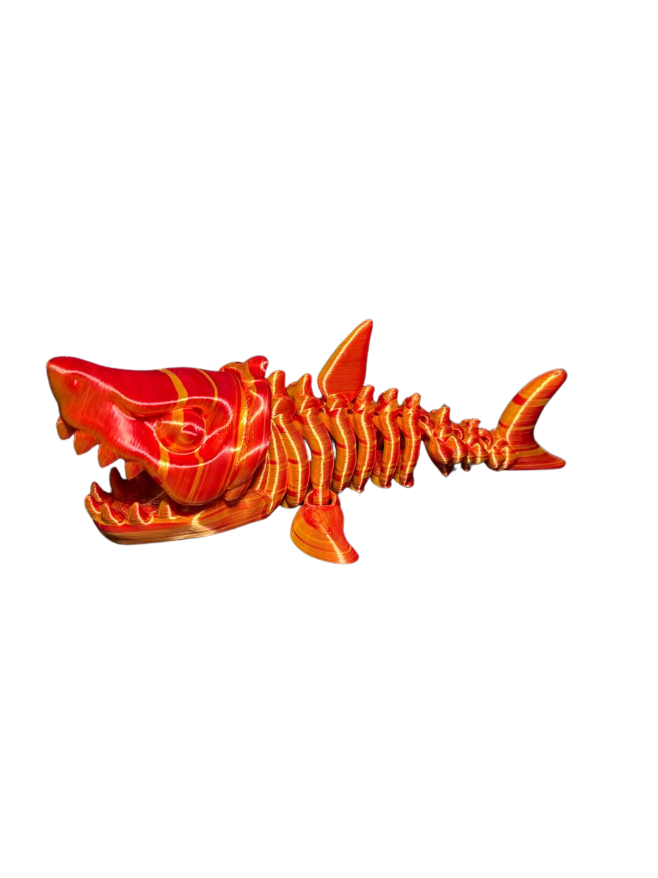 Esqueleto de tiburón articulado impreso en 3D en filamento tornasol naranja y rojo, de Tecnoprint